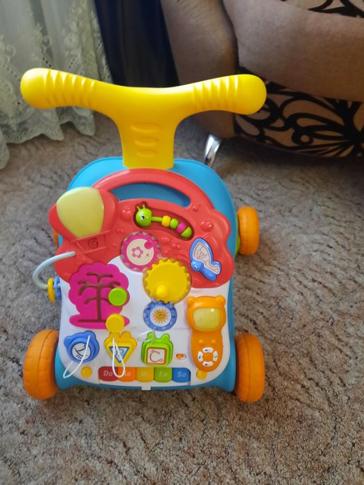 Дитяча каталка-ходунки з ігровою панеллю. Ходунки зі звуковими ефектам