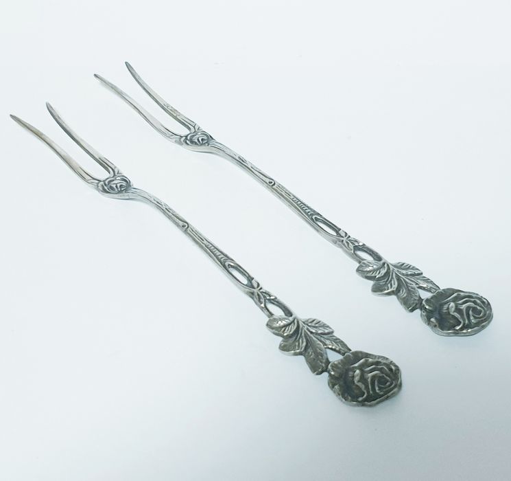 Pair of beautiful antique German silver serving forks