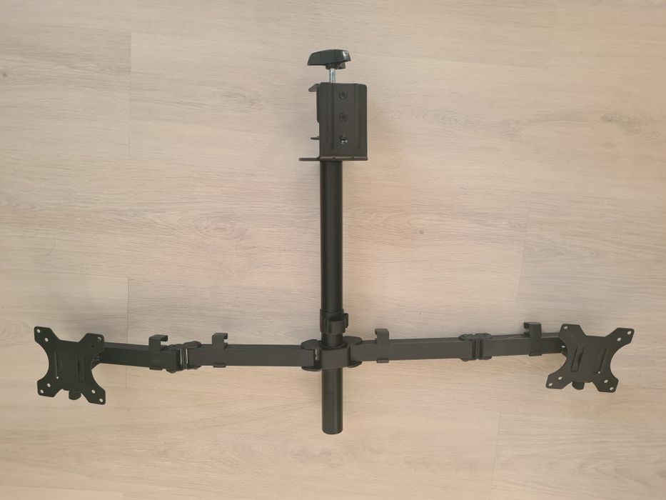 Sprzedam uchwyt na dwa monitory do 27 cali.