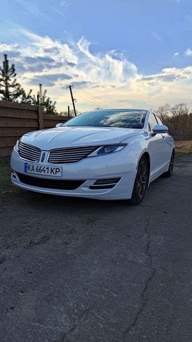 Гібрид бізнес класу. Розхід 5,5 по місту