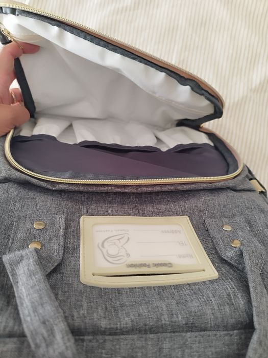 Mochila maternidade e berço portátil