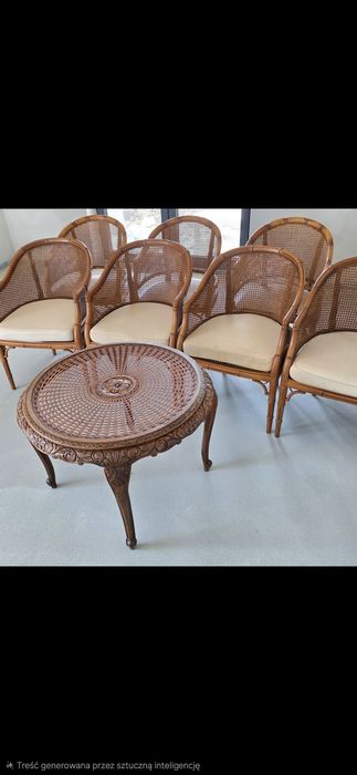 Komplet mebli rattanowych 7 foteli i ozdobny, rzeźbiony stolik kawowy