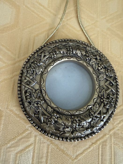 Moldura redonda de pendurar dourada
