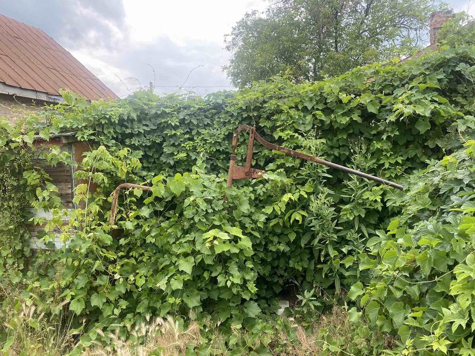 Ділянка з будинком  на раківці