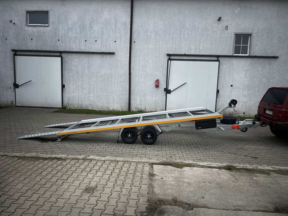 przyczepa laweta wynajem Warszawa Piaseczno Tarczyn 2-osiowa 2500kg DMC 2.5T 2,5T ładowność 1900kg - Przechylana - 2osie - koła 10’ - niska - 4,5m