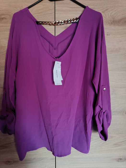 Nowa piękna bluzka z wywijanym rękawem