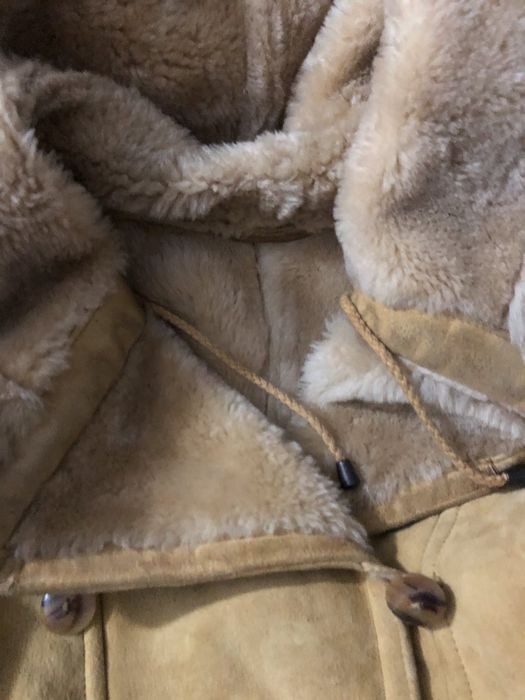 Теплая натуральная дубленка с кап