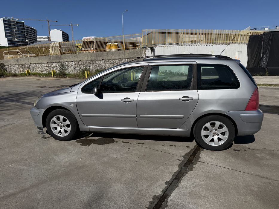 Peuogot 307 ano 2004  gasolina e gas
