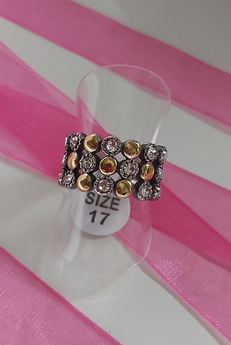 Anel bicolor, em aço, com zirconias. T17