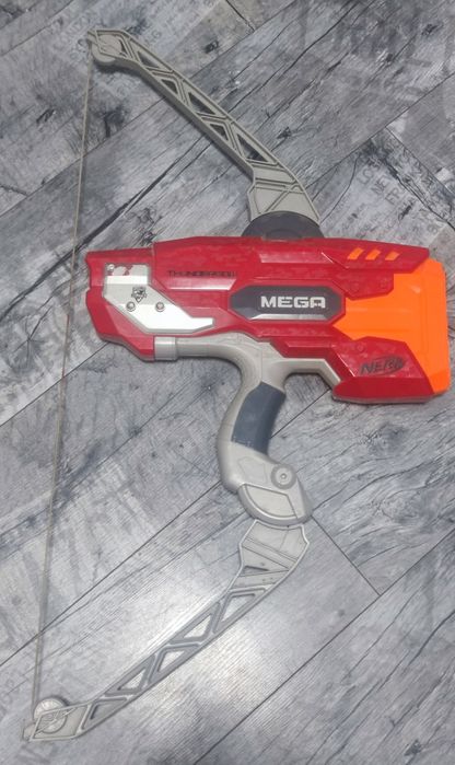 Pięć sztuk Nerf - pistolety,karabin,strzelba, łuk + strzałki