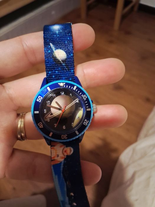 Analog Clock with Astronaut Image64575346385667122