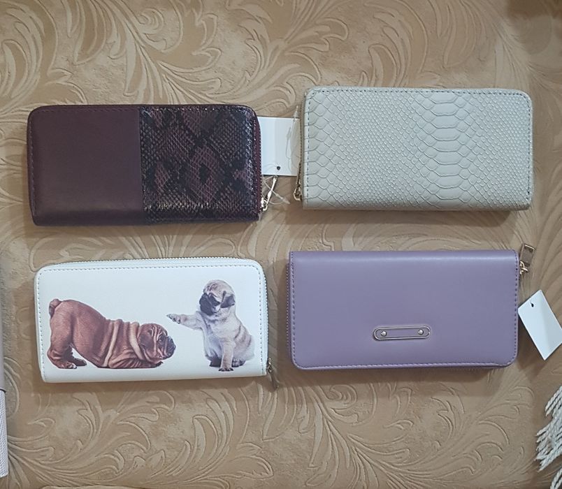 Кошельки продаю новые