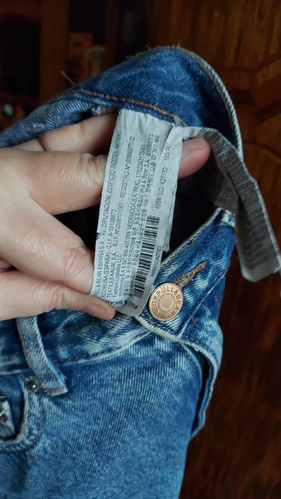 Spodnie jeansowe z dziurami Pull & Bear 32.