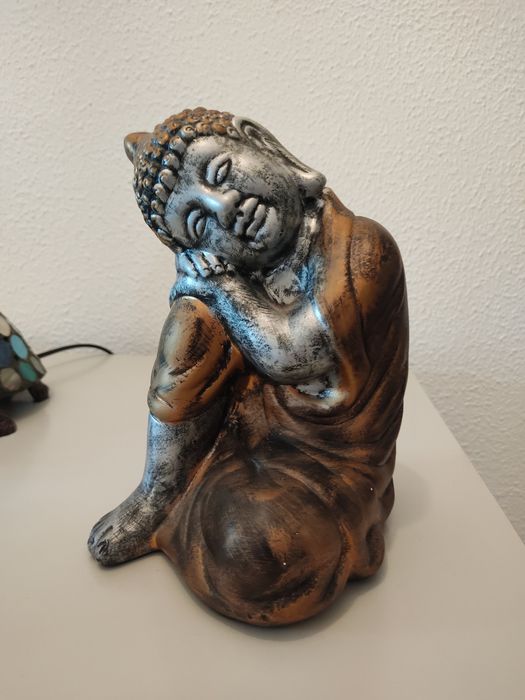 Buda em prata e dourado