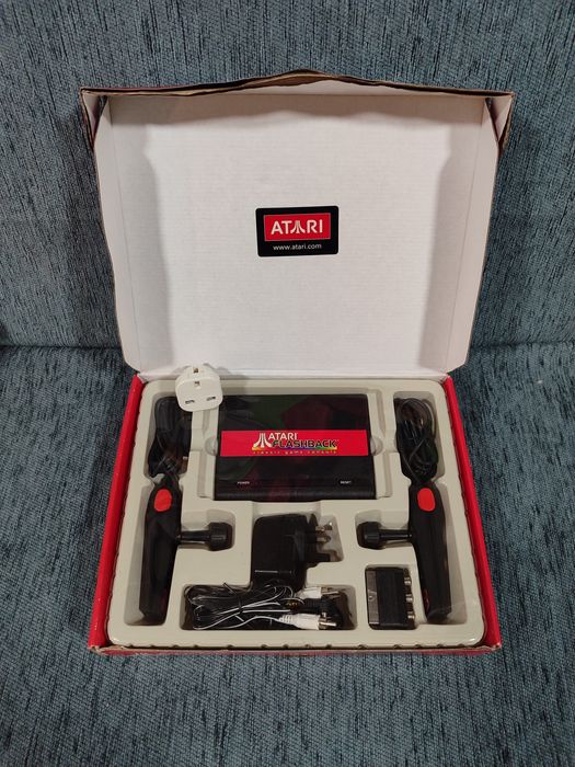 Atari Flashback 1
New, never used.

Box with some damage64586494134530120