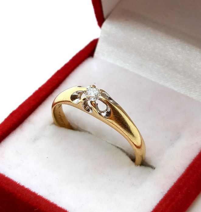 Złoty pierścionek z brylantem 0,11ct pr.585 W:2,40gr roz.16 InterSKLEP