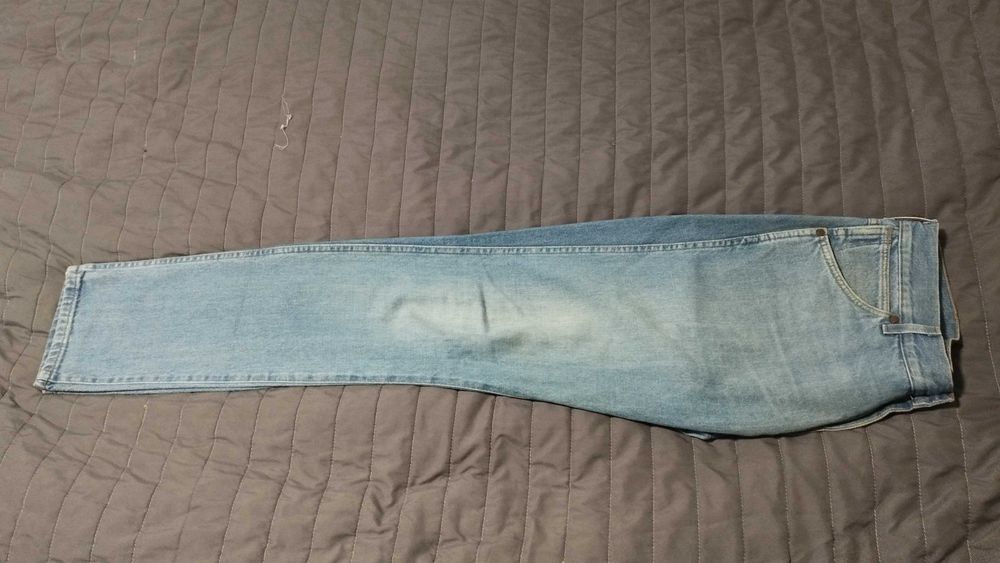 Spodnie męskie niebieskie Wrangler 100% cotton Slim Tapered