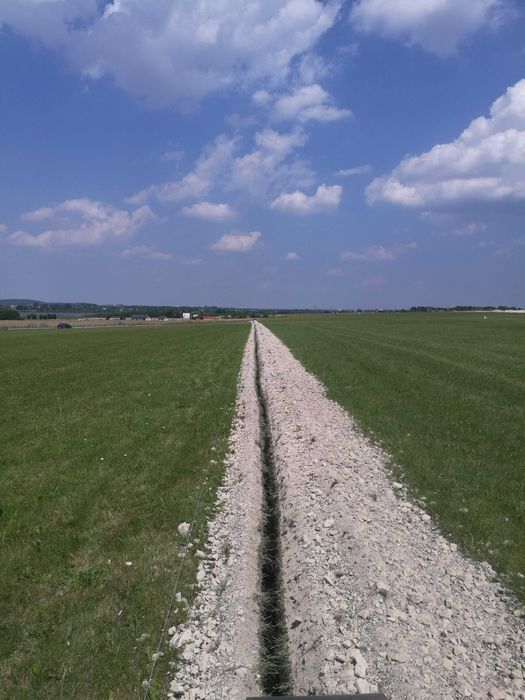 Usługi koparka łańcuchowa przecisk kret przebic dmuchiwanie światłowód
