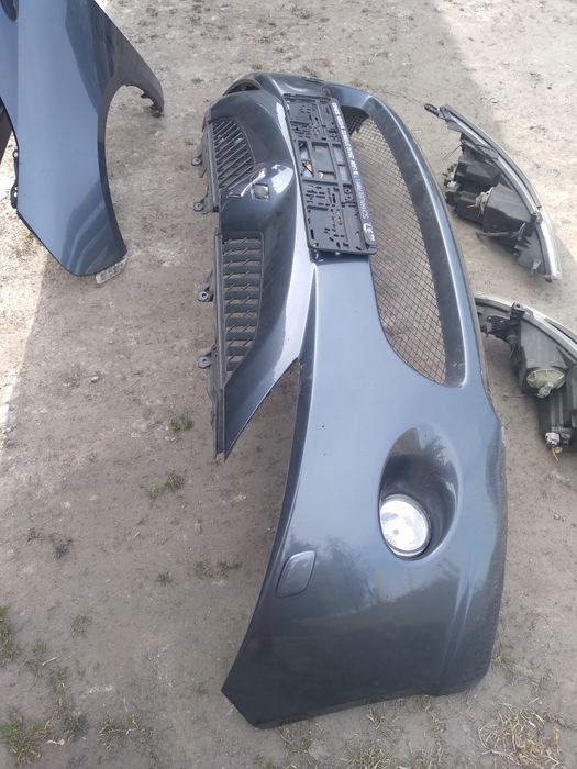 Zderzak Mitsubishi grandis A72 blotnik lampy