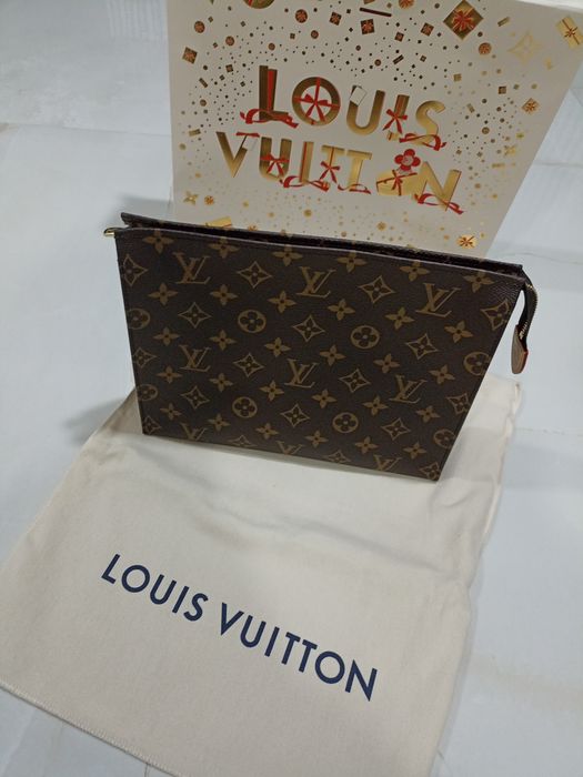Vendo Pochette Toilette LV Oficial Nova