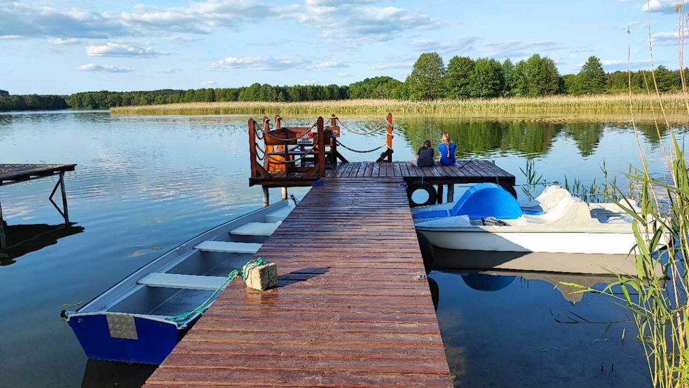 Dom do wynajęcia nad jeziorem - Pasym - pomost - łódka - rower wodny