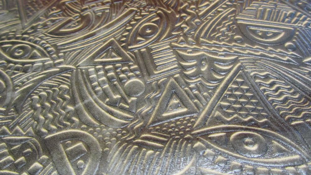 Портфель,толстая,тисненная кожа.