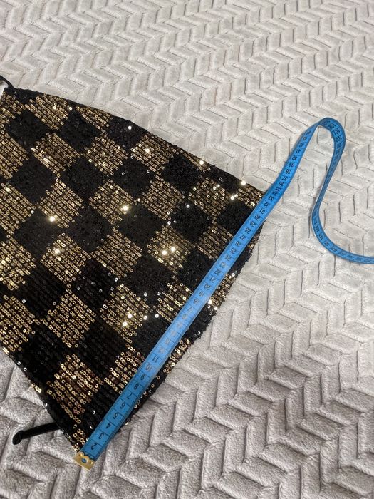 Топ в паєтках