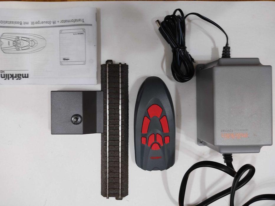 Comando Märklin Wireless com linha e transformador