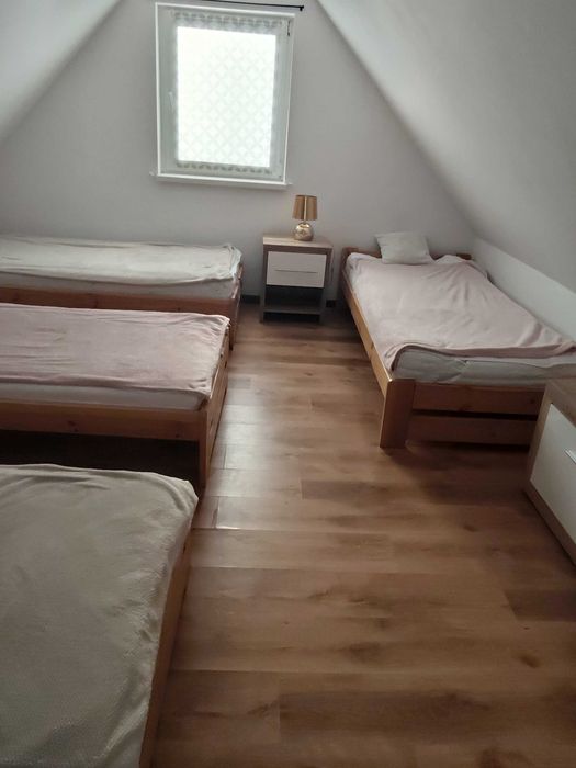 Domek nad jeziorem w Spychowie na Mazurach.