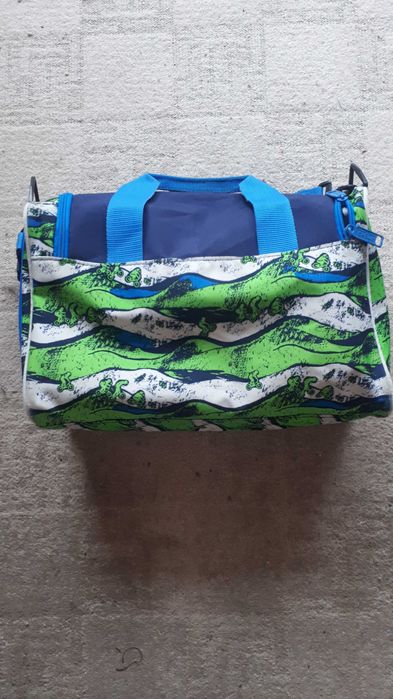 Яркая небольшая спортивная сумка Scout синяя с салатовым.