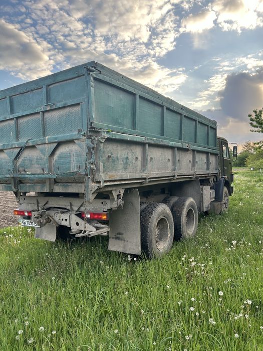 Камаз самоскид з причепом.