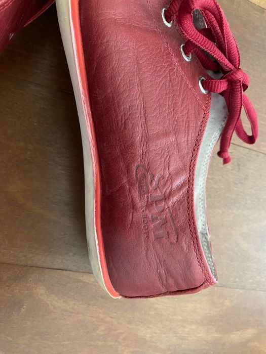 Sapatilhas em couro encarnadas