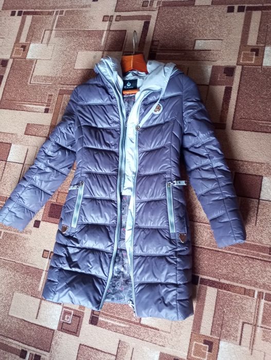 Продам пуховик .