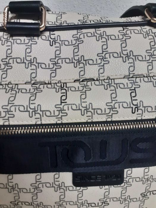 Mala senhora da Tous