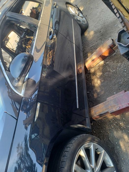 Passat B6 kombi drzwi lewe przód tył czarne 08r