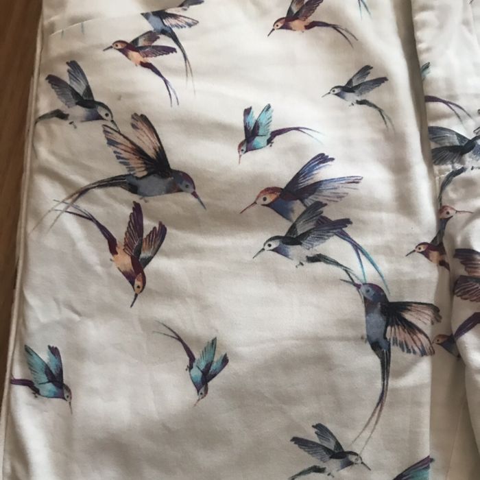 Calças brancas linho e estampada