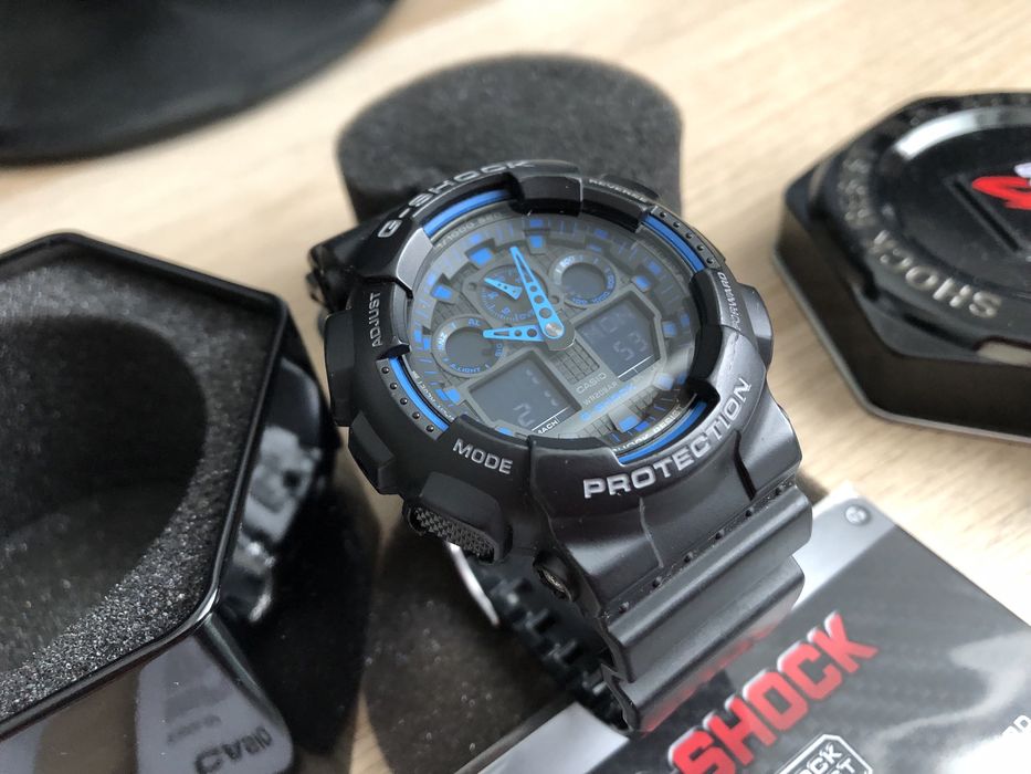 Zegarek Casio G-Shock oryginalny GA-100 czarno niebieski