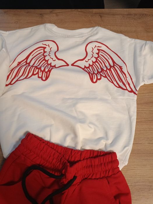 Dres Angel skrzydła dzwony 104/110
