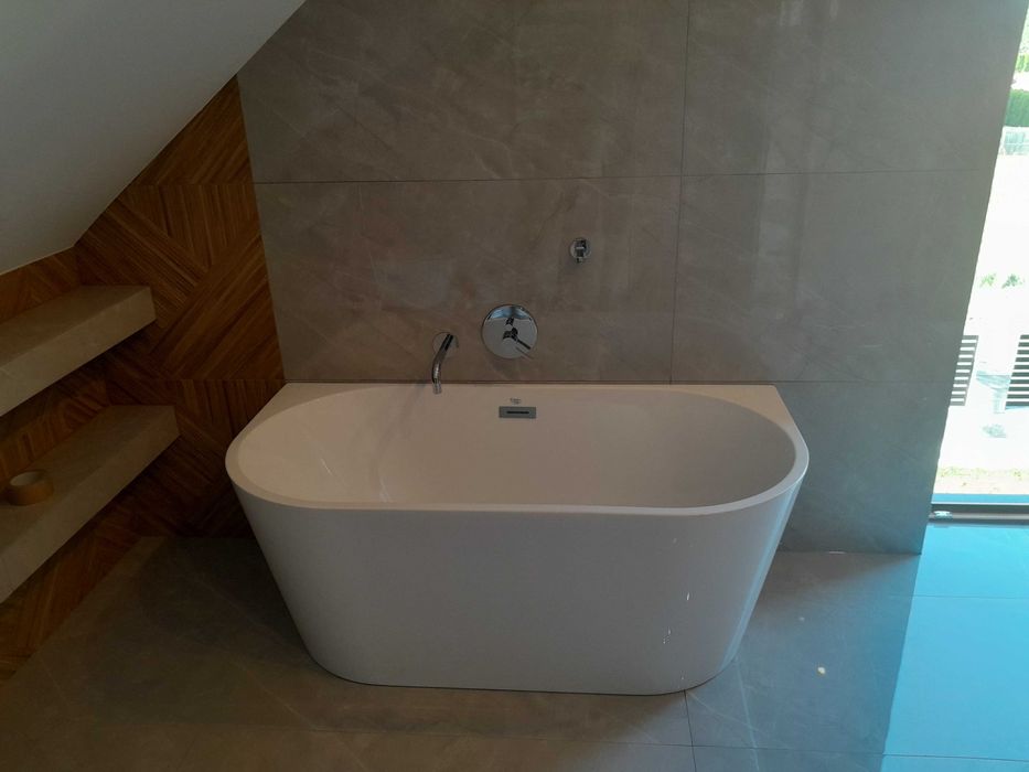 Wykończenia wnętrz Remonty Mieszkań Kuchnie Łazienki Układanie Płytek