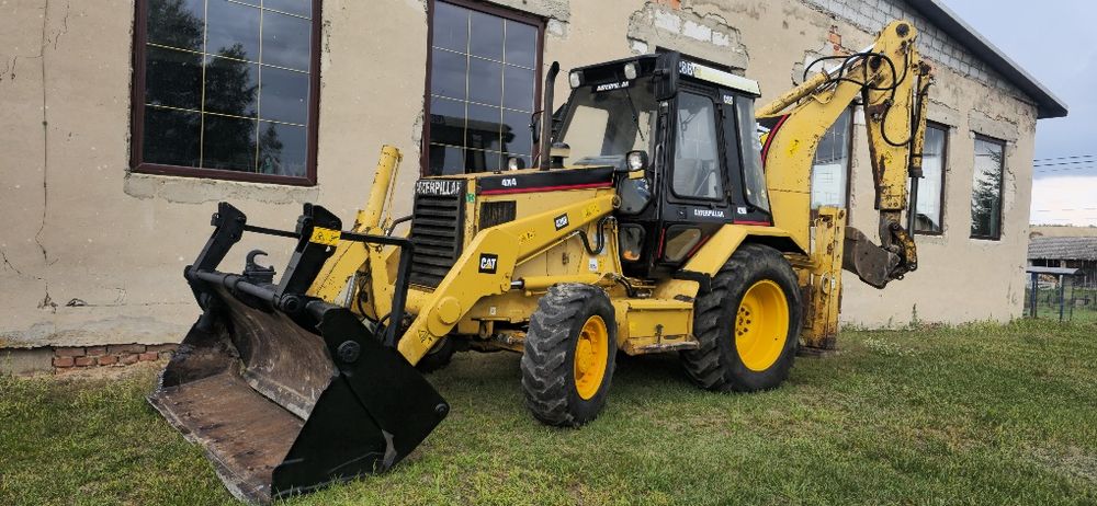 Sprzedam koparko ladowarka caterpillar cat 428b  4x4 pelna opcja