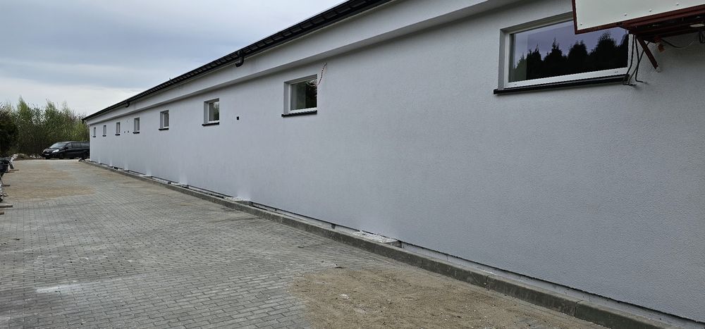 Domki jednorodzinne Klejenie styropianu, Tynk mozaikowy .