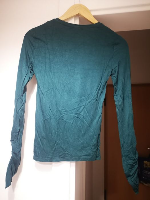 Camisola verde drapeada
