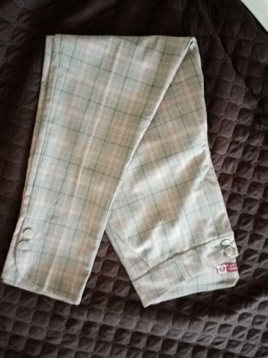 Calça de xadrex de meia estação