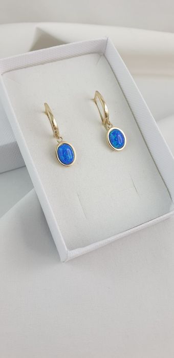 Złote wiszące kolczyki z  niebieskim opalem 585 nowe Zapięcie angielsk