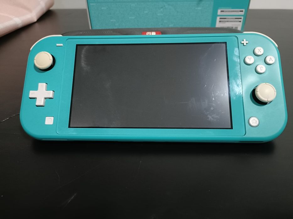 Nintendo Switch Lite Turquesa + Acessórios