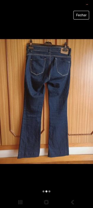 Calças á boca de sino,push up,tamanho 34,Artigli,novas