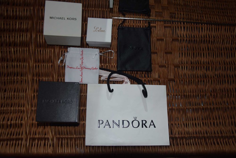Pudełka worki przeciwkurzowe Guess Pandora Lilou Michael Kors i inne