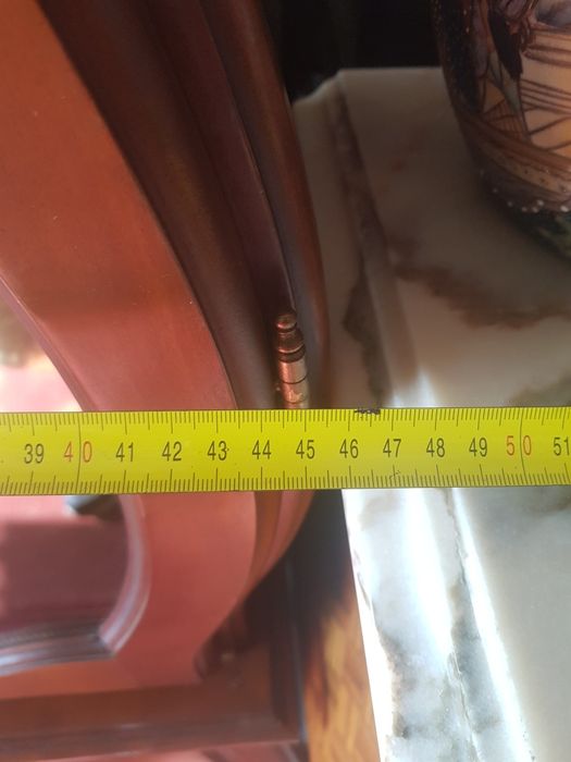 Relógio de coluna a corda