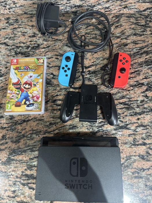 Nitendo switch ( com jogo , com carregador , cabo HDMI , comando , e mala para transportar a nitendo