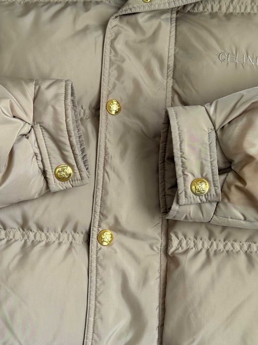 Жіноча пухова куртка